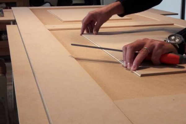 Pannello su misura per porta blindata